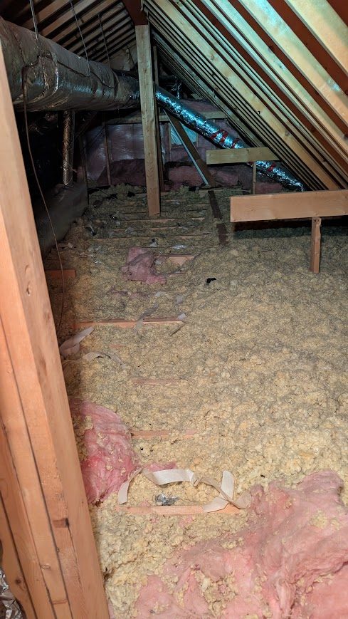 Nobleton attic before a safe furnace access walkway was installed